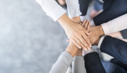 Stack of hands. Unity and teamwork concept.