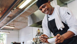 Gourmet chef cooking in a commercial kitchen