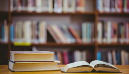 Books on desk in library