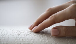 blind-person-reading-home