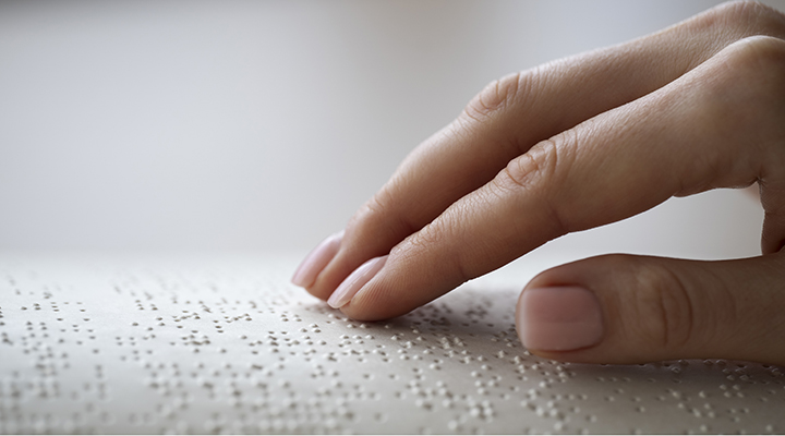 blind-person-reading-home