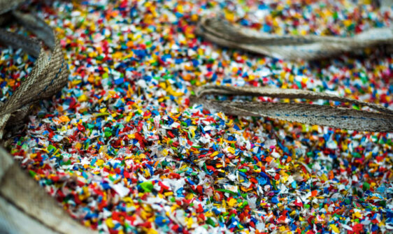 Shredded plastic garbage at waste recycling factory